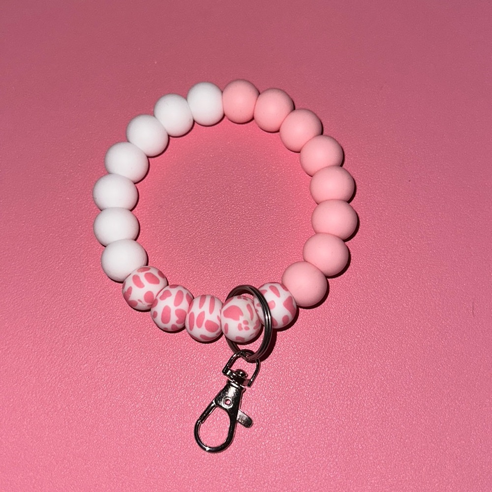 Pink cow print beaded wristlet